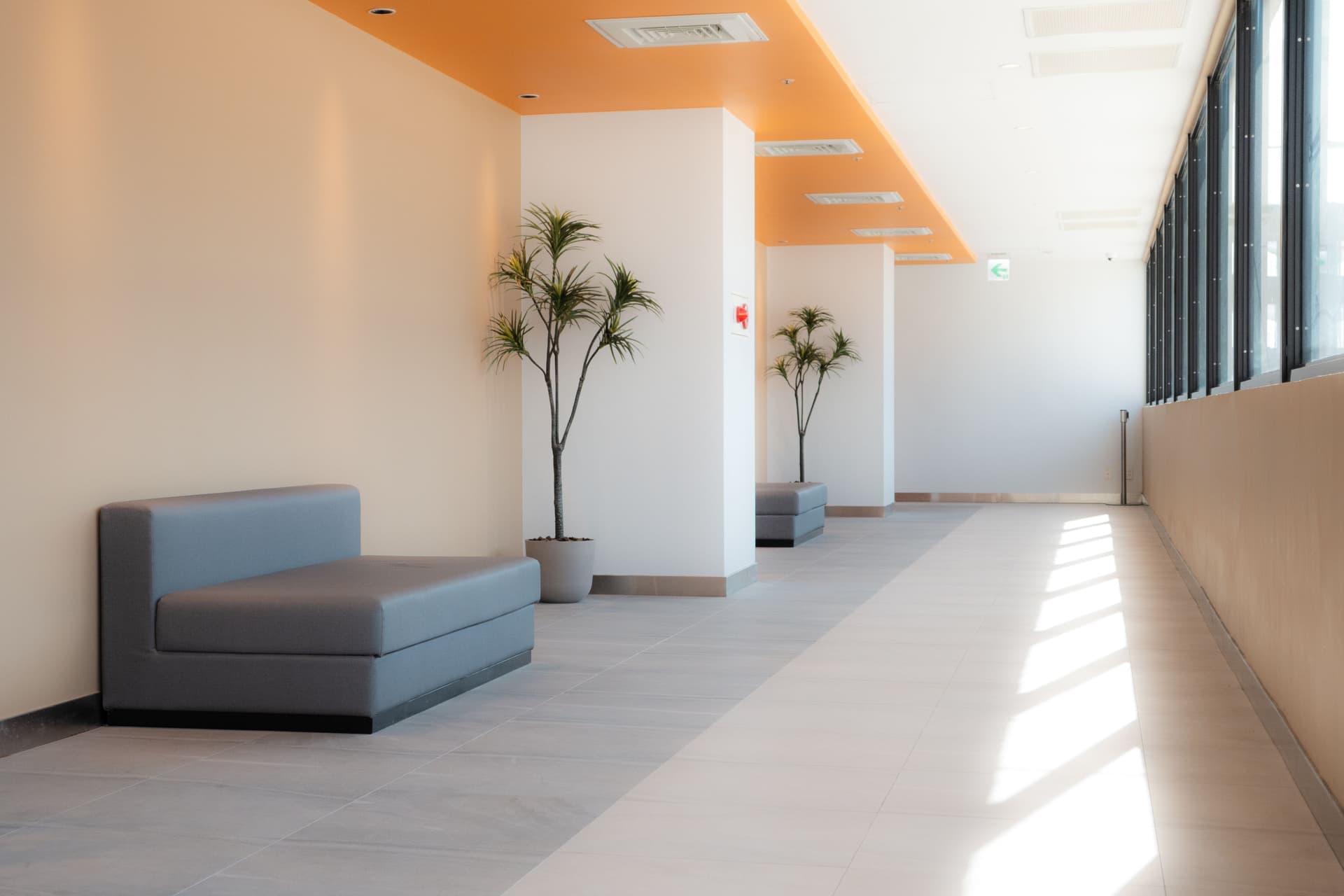 Office corridor with polished floor — commercial cleaning by Shai & Fortuna